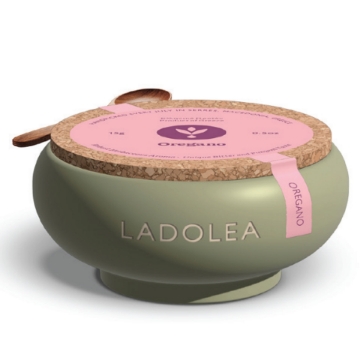 Organic Oregano in Handmade Ceramic Bowl – Ancient Tableware Organic oregano in a handmade ceramic bowl with ancient-inspired design.