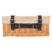 Front view of buff willow gift hamper showing black leather handle and buckle straps.