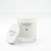 Aurean luxury scented candle in glass jar with lid, premium Greek ambiance candle minimalist white background